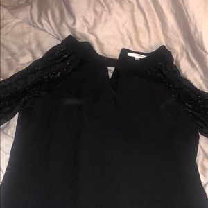 Black dress with lace sleeve and keyhole front